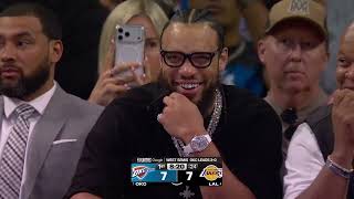 The camera focuses on Dillon Brooks, who is laughing and watches LeBron James take his free throws