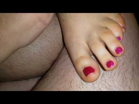 Removing her sockless Nike Epic React after a day out