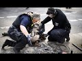 Police use drill to free activist's hand during climate protest in Germany