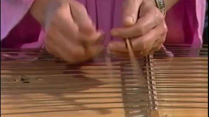 Constance Demby playing the hammered dulcimer