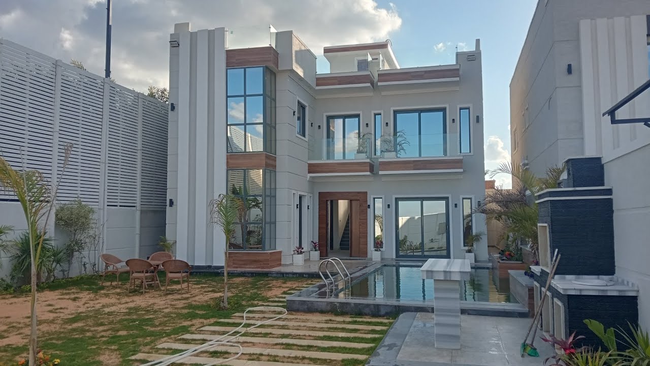 فيلا مسجلة للبيع مساحه 400متر  قريبه من الطريق الرئيسي للتواصل محمود للتسويق العقاري 01010150636