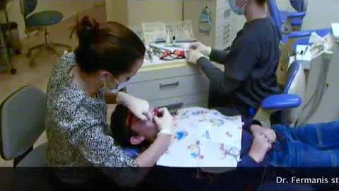 Putting on braces at  Brooklyn Family Orthodontics
