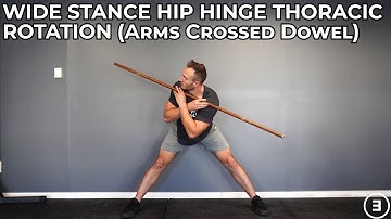 Wide Stance Hip Hinge Thoracic Rotation (Arms Crossed Dowel)
