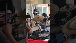 Drumming a funky fill in a steady groove during a live improvisation by a free funk collective (HQ)