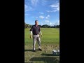 Golf: Easy drill to tilt your shoulders correctly.