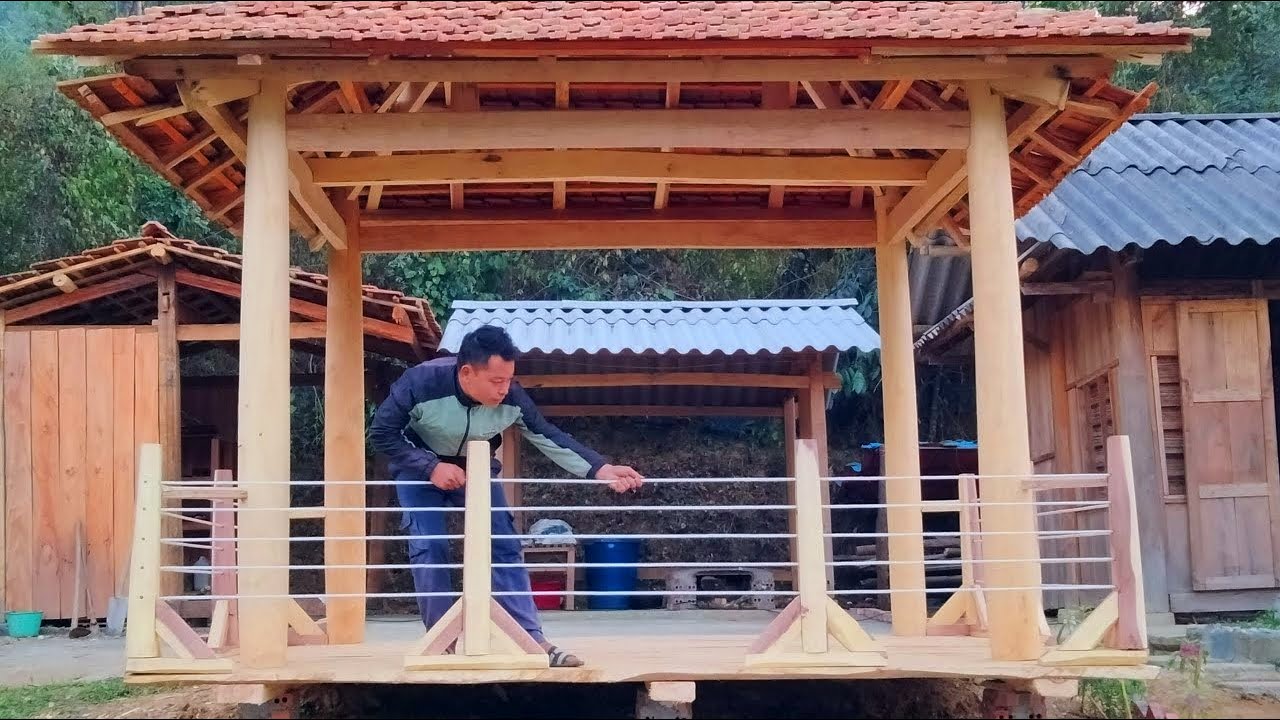 A rope railing I woven beautifully around the wooden hut - Building Green Life