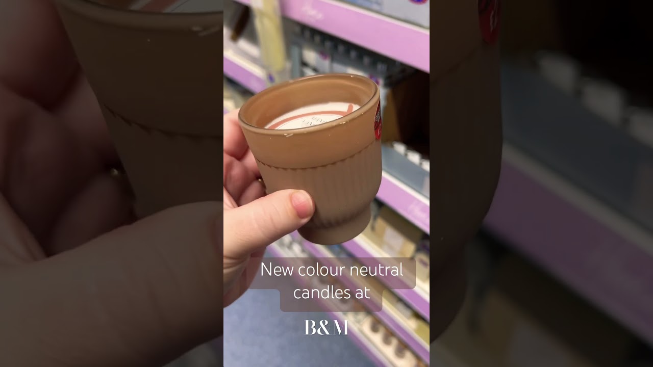 Colour neutral glass candles at B&M 