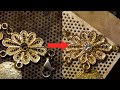 قرار دادن الماس در گل طلای ۲۱ عیار استاد زرگر در حال کار قرار دادن الماس در گل طلای ۲۱ عیار استاد زرگر در حال کار