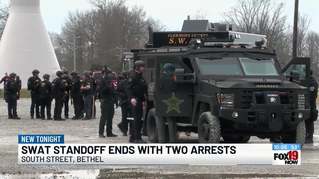 SWAT standoff ends with two arrests - YouTube