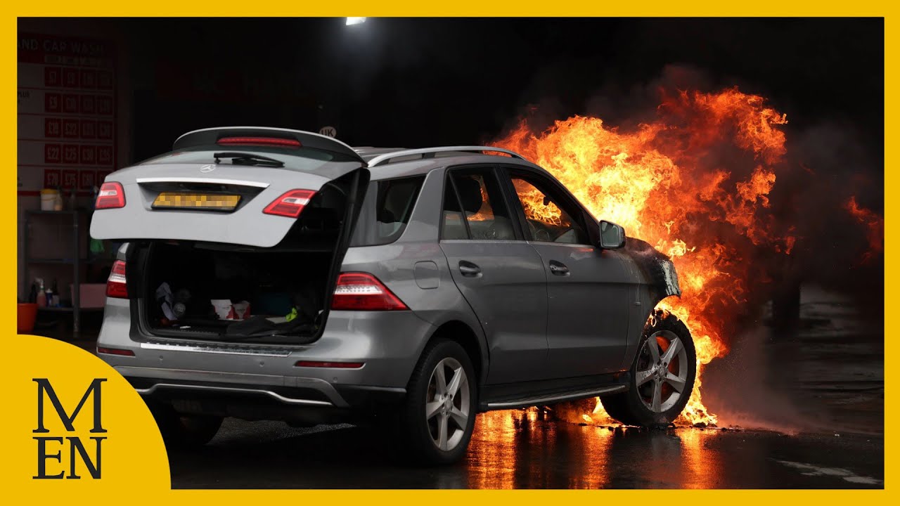 Car bursts into flames at car wash in Manchester