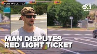 Man raises concerns about Pensacola red light camera ticket says he was out of town