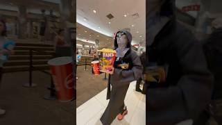 Person dressed as an alien walks around movie theater during disclosure day premiere #disclosureday