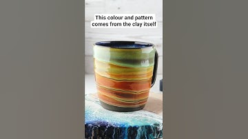 Adding a pattern using colourful liquid clay #ceramic