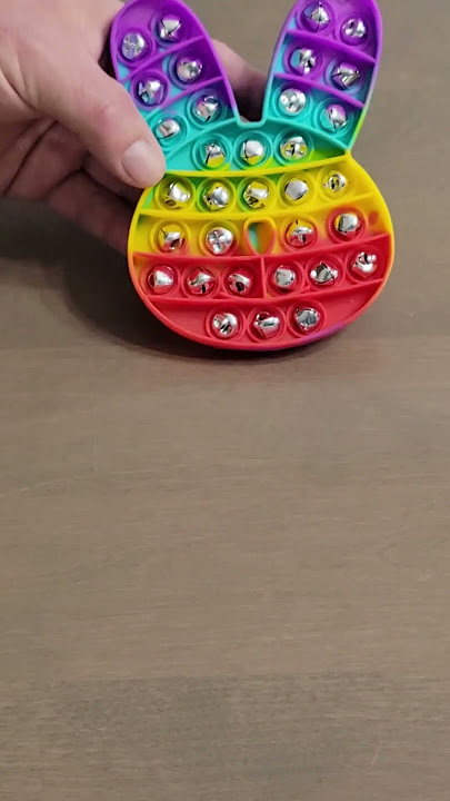 Colorful rabbit / bunny with jingle bells