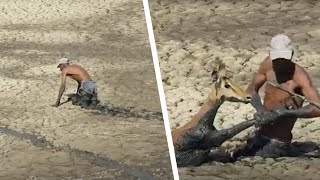 最後の力を振り絞って動物の足を引っ張り、バッドエンドから救ってあげた男性。