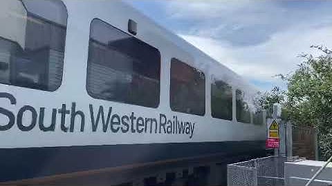 SWR class 444 001 passing through Poole level crossing