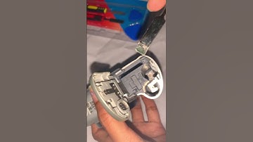 How to remove stuck cr1220 battery from canon powershot camera #shorts #trending #youtubeshorts