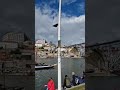 Eating a churro across the river in Porto, Portugal