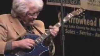 Larry Coryell  -  Love is here to stay chords