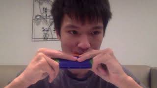 stupid tone deaf asian kid plays mii song on harmonica
