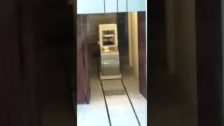 Coffin going into the crematorium