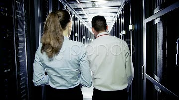 It Engineers Working In A Data Center. Stock Footage
