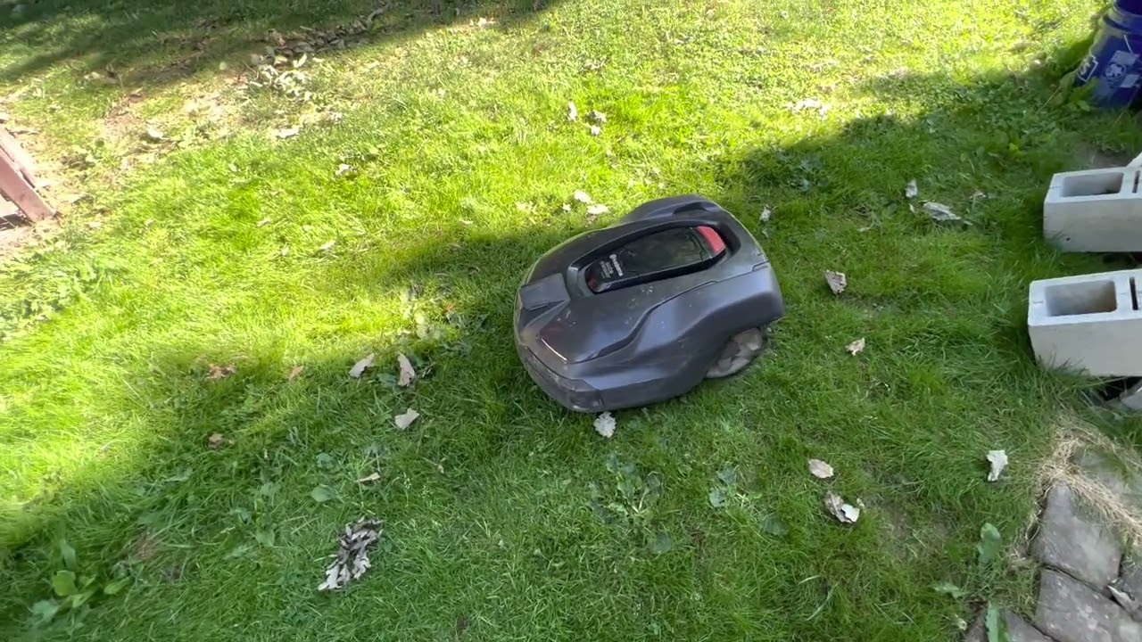 Robot lawnmower gets stuck on swingset￼