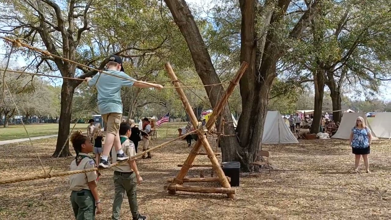 Scotty crosses the rope bridge at Pioneer Days