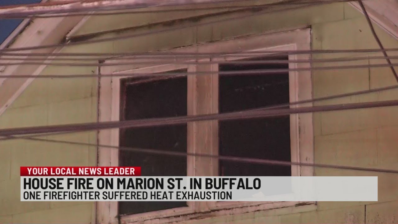 Firefighter taken to hospital during house fire - YouTube