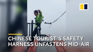 Safety cord tied to Chinese tourist unfastens mid-jump on high-altitude bridge