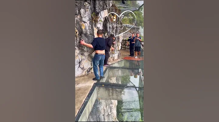 Glass Walk Sky Bridge Longtoushan mountain the best Tourism Place in China #shortsfeed #shorts - DayDayNews