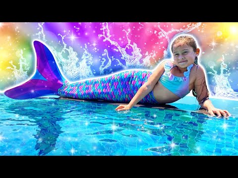 Girl turned into a Little Mermaid Princess - Kids pretend play at the swimming pool.