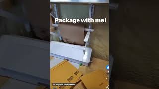 My wife packaging last nights sales after we went to bed.