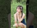 Whispers in the Meadow: Young Love Blossoms in Grass Fields.