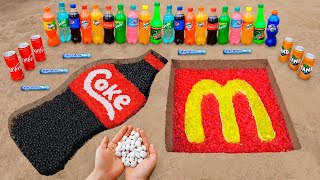 Giant Coca-Cola &amp; McDonald&#39;s Logos Underground with Mentos, Orbeez and Popular Sodas