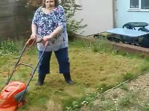 This is me cutting the grass with my old Flymo lawnmower.