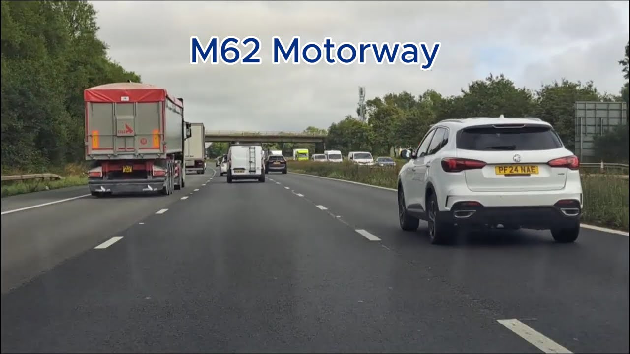 Driving from Widnes to Manchester on M62 Smart Motorway.