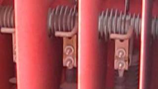 Cleaning tops of horizontal insulators.AVI