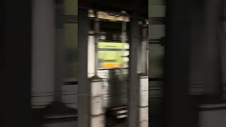 R46 Q train arriving at Times Square-42nd Street with married pairs
