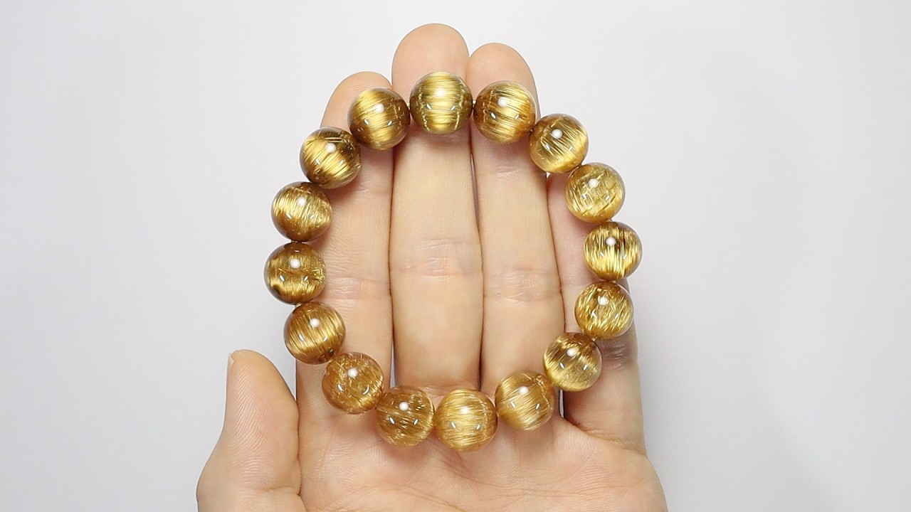 タイチン　天誅　12mm ブレスレット タイチンキャッツアイルチルクォーツ 12mm～12.5mm玉 ブレスレット