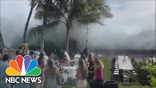 Watch: Large Waves Crash Over Seawall, Wipe Out Part Of Outdoor Hawaiian Wedding
