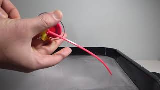 Small Toy Gyroscope with Plastic Stem on Grooved Ice Case Keeps Spinning Off Groove. Total 0:40