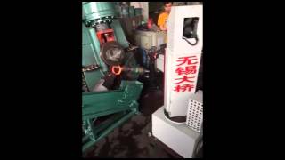 Robot with CNC ring rolling machine