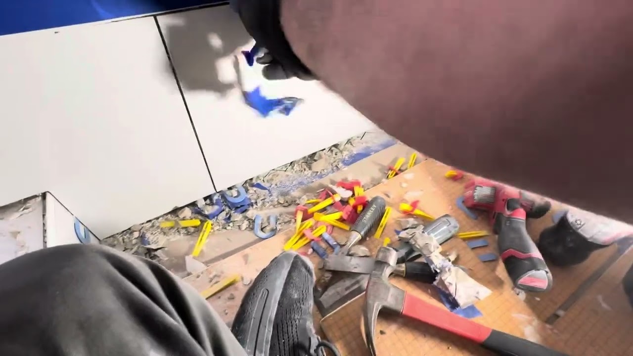 How to remove a chipped porcelain tile in shower