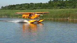 Savage Classic Amphib taking off on the West Twin River, Two Rivers, WI