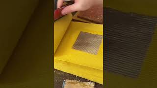 the installation of a stamp on a large amount of paper is done manually #automobile