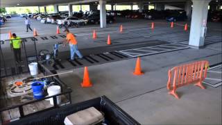 PARKING LOT STRIPING BY PERMASTRIPE UNIVERSAL GARAGE