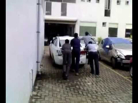 Behind the Geeyem Motors Cochin, Chevrolet Cruze i...