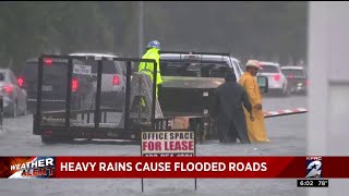 Heavy rains cause flooded roads in Galveston