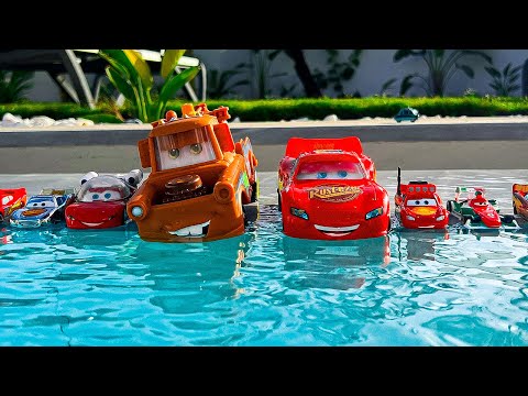 Disney Pixar Cars falling into deep pool, Lightning McQueen, Tow Mater, Mack, Sally, Francesco